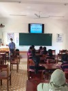 Đồng chí Nguyễn Xuân Thao báo cáo tại buổi truyền thông phòng, chống xâm hại tình dục trẻ em ở xã Canh Liên, huyện Vân Canh