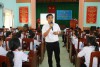 Đồng chí Phạm Hồng Hải báo cáo tại buổi truyền thông kỹ năng sử dụng internet an toàn cho trẻ em tại xã Mỹ An, huyện Phù Mỹ