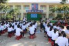 Đồng chí Phạm Hồng Hải báo cáo tại buổi truyền thông về kỹ năng phòng, chống bạo lực, xâm hại trẻ em tại trường THCS An Tân, xã An Tân, huyện An Lão